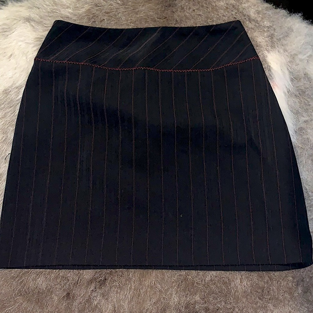 Black mini skirt with red pin stripes. Fashion bug
